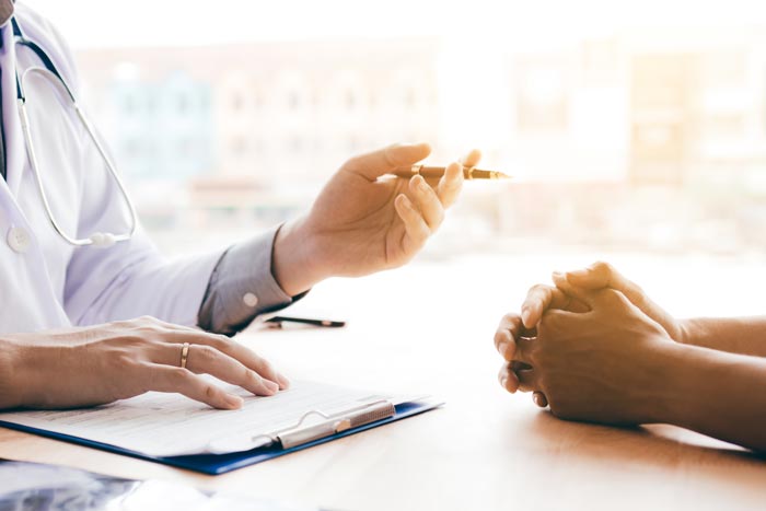doctor consulting with patient